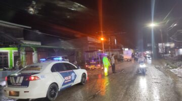 Luapan Air Rendam Jalan Lintas Kutacane–Medan, Polres Aceh Tenggara Atur Arus Lalu Lintas Di Desa Kuning I